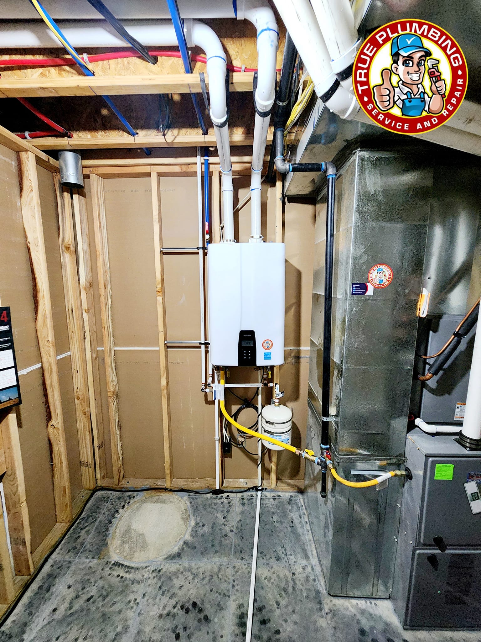 Tankless water heater installation completed by plumber providing high efficiency on demand hot water for residential home