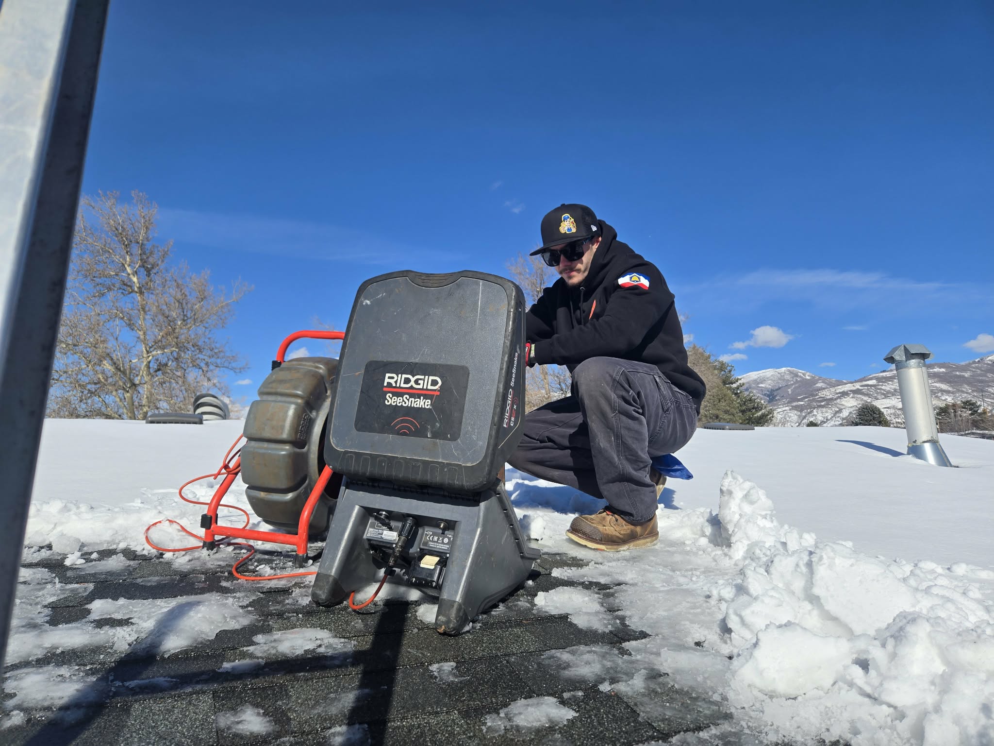 Sewer camera inspection performed by plumber in Utah inspecting underground drain line to diagnose sewer blockage and plumbing issues