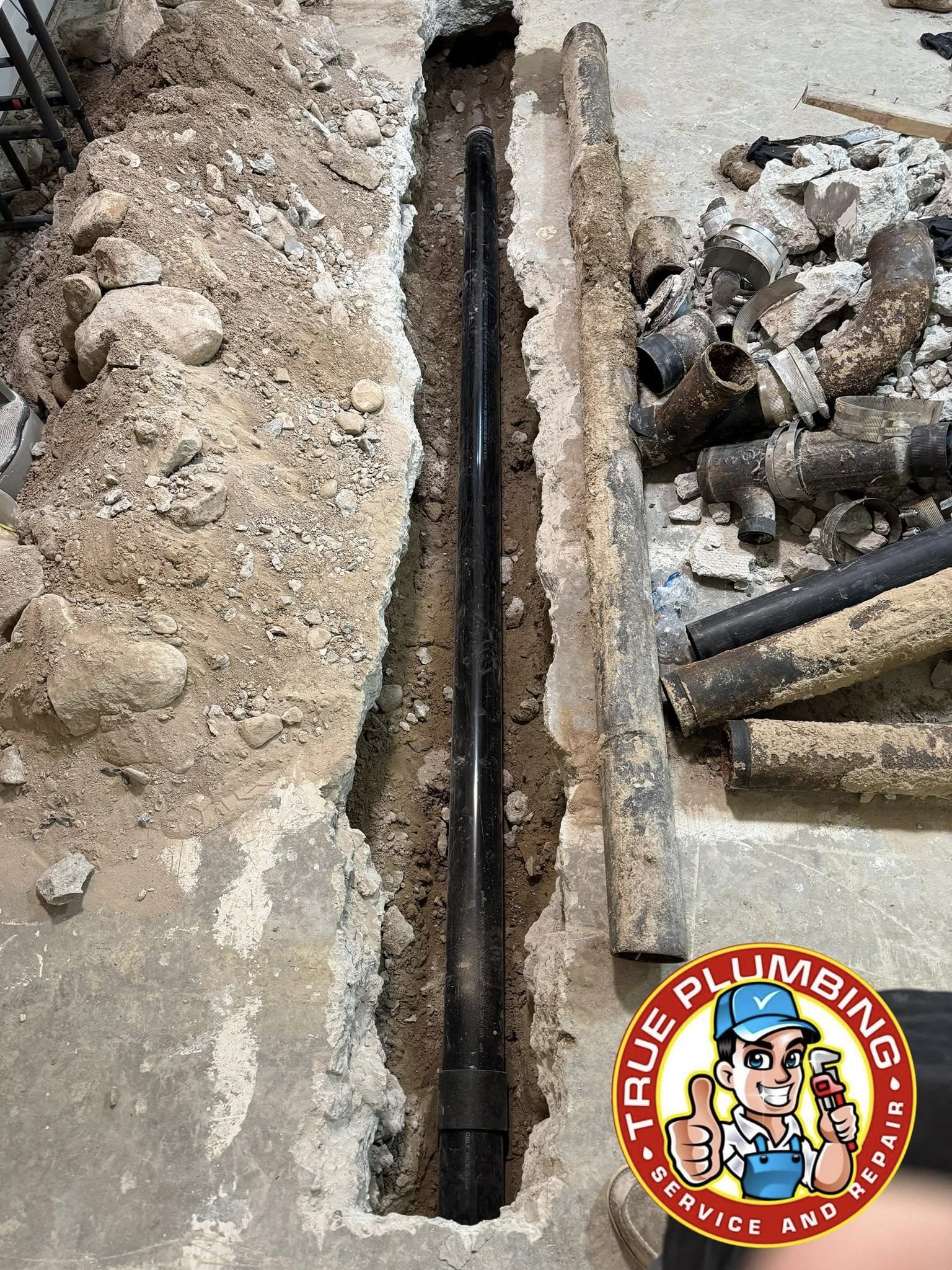 Plumber repairing damaged sewer line to restore proper drainage and sewer system function