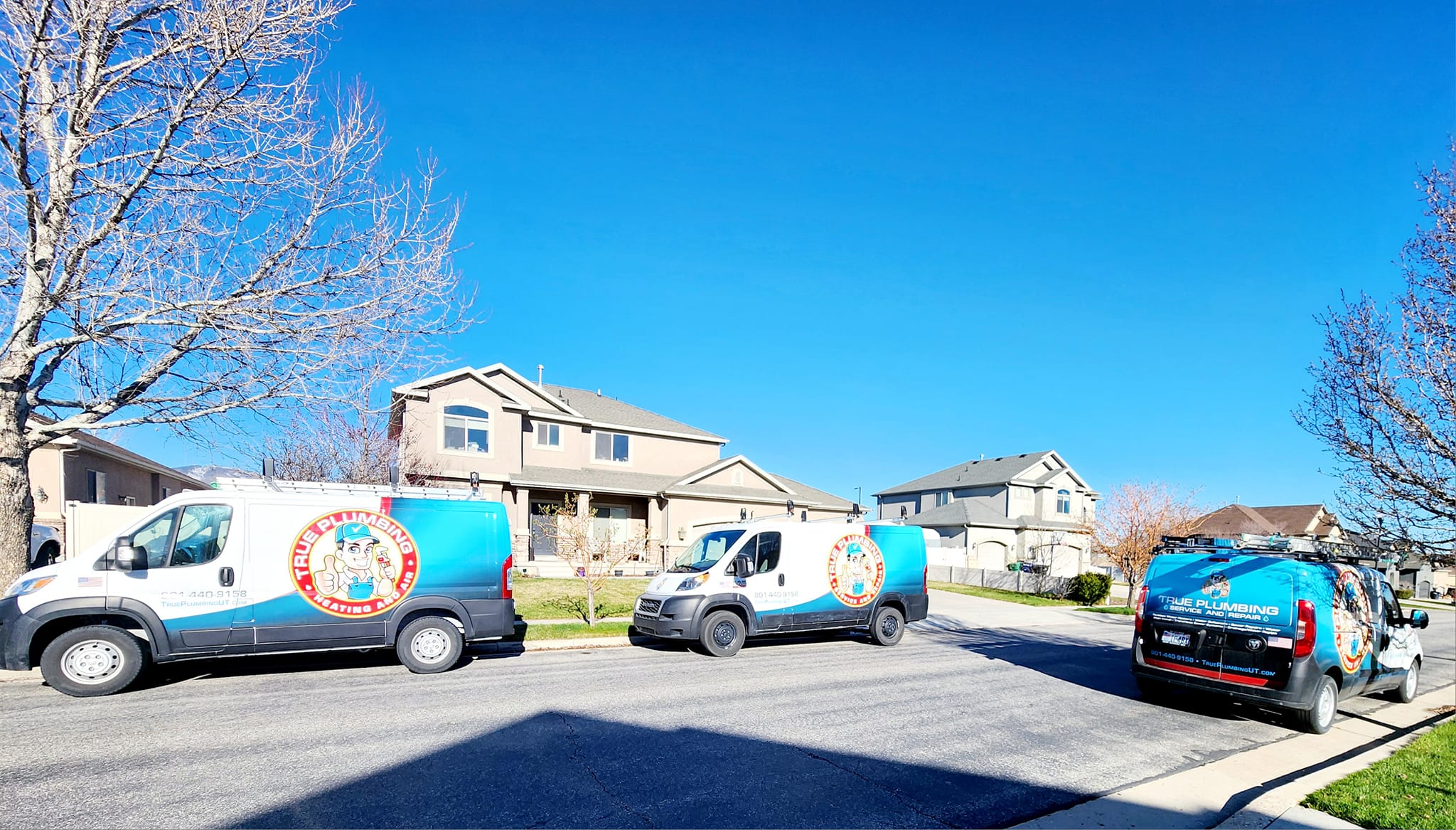 True Plumbing service vans serving Stansbury Park Utah